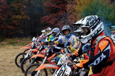 Plymouth Sands Trail Riders 
On Sunday, October 28, the Plymouth Sands Trail Riders bike club held a hare scramble at the Mattapoisett landfill.  The club, which boasts over 300 members from all around New England, had over 100 riders participate in the event.  Riders from teens up to seniors took off for the 40 minute races around the 2.5 mile wooded track.  Proceeds from the event will be part of an annual donation the club makes to fund cystic fibrosis research. Photo by Eric Tripoli
