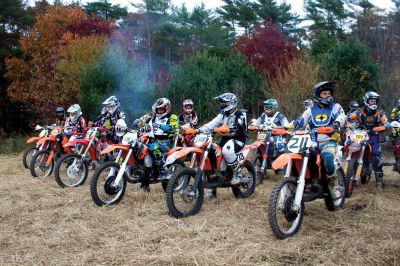 Plymouth Sands Trail Riders 
On Sunday, October 28, the Plymouth Sands Trail Riders bike club held a hare scramble at the Mattapoisett landfill.  The club, which boasts over 300 members from all around New England, had over 100 riders participate in the event.  Riders from teens up to seniors took off for the 40 minute races around the 2.5 mile wooded track.  Proceeds from the event will be part of an annual donation the club makes to fund cystic fibrosis research. Photo by Eric Tripoli
