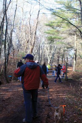 Hot-To-Trot Dog Walk
On November 30, a spring-like winter’s day, the Sippican Lands Trust held its 2nd annual Hot-To-Trot Post-Thanksgiving Day dog walk. About 12 dogs of all shapes and sizes brought their humans out for a guided tour of the White Eagle property located off Route 6 in Marion. Dogs received stylish orange neckerchiefs and dog treats. Photo by Marilou Newell
