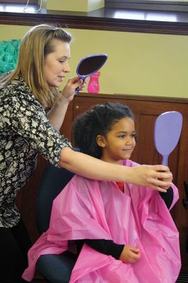 Doll Spa
The Mattapoisett Library treated area kids and their dolls to a spa day on Friday, January 15. With a day off from school, girls had their hair styled by Holly Coutinho, had their nails done by Junior Friend Alice DeCicco-Carey, 11, and decorated hair clips with Junior Friend Nicole Londergan. Photos by Jean Perry
