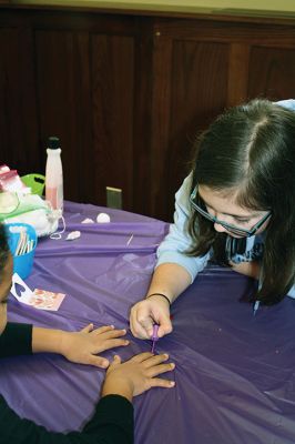 Doll Spa
The Mattapoisett Library treated area kids and their dolls to a spa day on Friday, January 15. With a day off from school, girls had their hair styled by Holly Coutinho, had their nails done by Junior Friend Alice DeCicco-Carey, 11, and decorated hair clips with Junior Friend Nicole Londergan. Photos by Jean Perry
