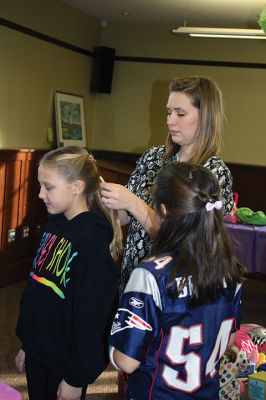 Doll Spa
The Mattapoisett Library treated area kids and their dolls to a spa day on Friday, January 15. With a day off from school, girls had their hair styled by Holly Coutinho, had their nails done by Junior Friend Alice DeCicco-Carey, 11, and decorated hair clips with Junior Friend Nicole Londergan. Photos by Jean Perry
