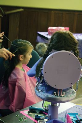 Doll Spa
The Mattapoisett Library treated area kids and their dolls to a spa day on Friday, January 15. With a day off from school, girls had their hair styled by Holly Coutinho, had their nails done by Junior Friend Alice DeCicco-Carey, 11, and decorated hair clips with Junior Friend Nicole Londergan. Photos by Jean Perry
