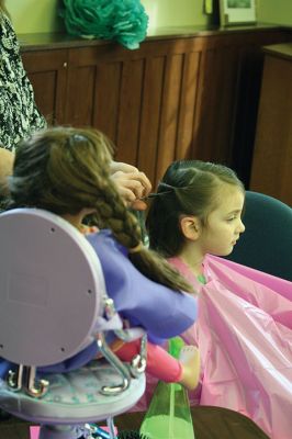 Doll Spa
The Mattapoisett Library treated area kids and their dolls to a spa day on Friday, January 15. With a day off from school, girls had their hair styled by Holly Coutinho, had their nails done by Junior Friend Alice DeCicco-Carey, 11, and decorated hair clips with Junior Friend Nicole Londergan. Photos by Jean Perry
