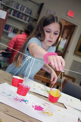 Drip Art
After school on April 22, a group of students headed right over to the Taber Library for an afternoon of “drip art” and making buttons to pin on the button mural as “Art Month” at the library comes to a close. Photos by Jean Perry
