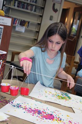 Drip Art
After school on April 22, a group of students headed right over to the Taber Library for an afternoon of “drip art” and making buttons to pin on the button mural as “Art Month” at the library comes to a close. Photos by Jean Perry
