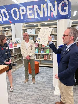 Elizabeth Tabor Library
From the re-opening of Marion’s Elizabeth Tabor Library on Monday, March 24. State Representative Mark Silva (D-10) pictured giving a congratulatory state citation. Pictured from left to right: Director Elizabeth Sherry, Board of Trustees Association President David Finn-Clark, and Representative Mark Silva. Photo by Jayson Newell. March 27, 2025 edition

