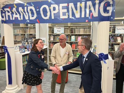 Elizabeth Tabor Library
From the re-opening of Marion’s Elizabeth Tabor Library on Monday, March 24. State Representative Mark Silva (D-10) pictured giving a congratulatory state citation. Pictured from left to right: Director Elizabeth Sherry, Board of Trustees Association President David Finn-Clark, and Representative Mark Silva. Photo by Jayson Newell.
