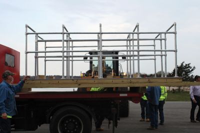 Eagle Scout Project
Adam Perkins of Mattapoisett has completed his Eagle Scout project, kayak racks for Shipyard Park. From September 2014 through April 2015 he managed all aspects of the project from securing funding, acquiring materials, to building the racks. On May 5 the racks where transported from his home on Abbey Lane to Shipyard Park by the Highway Department. On hand to receive the gift on behalf of the town was Harbormaster Jill Simmons.
