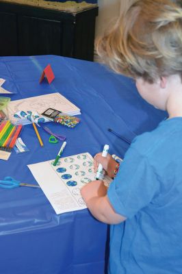 Marion Natural History Museum 
The Marion Natural History Museum hosted their very first Earth Day Celebration on April 19, providing little ones with activities that focused on our planet and stimulated their senses. There was a make your own planet earth pinwheel table, a station to decorate your own “Earth cookie” with green and blue icing, a puppet show stage, and a boat load of Legos to play with while the sounds of croaking frogs and crickets played in the background. Photo by Jean Perry
