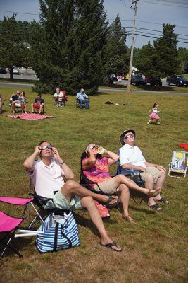 Partial Eclipse, Total Excitement 
The Plumb Library welcomed celestial spectators on Monday for the region’s partial eclipse of the sun, handing out free eclipse glasses. Photos by Glenn C. Silva
