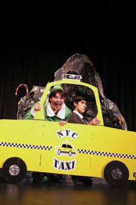 Elf!
Make way for Buddy the Elf! – Our newest favorite elf has made his way to the Tri-Town in the ORRHS Drama Club’s Christmas production of Elf the Musical. Opening night is Thursday, December 5, with shows and special “Santa Matinees” running until Sunday, December 8. Pictured here, Buddy, played by Andrew Steele, is ecstatic to have found his estranged and rather grumpy human birth father, Walter Hobbs, played by Luke Cuoto. Photo by Jean Perry
