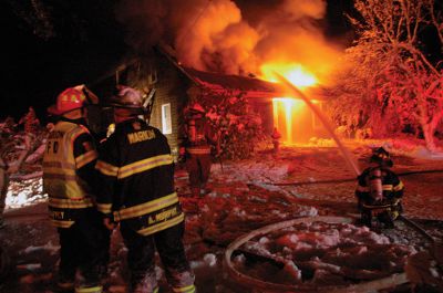 Crystal Springs Fire
The Mattapoisett Fire Department responded to a structure fire on Sunday evening. Hampered by the snow and ice they chased the fire through the walls and roof of the house and were eventually able to gain control. The house sustaining significant damage and one firefighter was injured during the incident. Photos by Charles Hutchison, Artisan Ingenuity Photo
