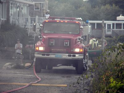 Bay Road Fire
The Mattapoisett Fire Department responded to a house fire on Bay Road at Point Connett around 7pm on Thursday July 22, 2010. The front of the structure was heavily damaged but the Fire Department was able to quickly contain the fire and keep it from spreading to neighboring homes. Photo by Paul Lopes
