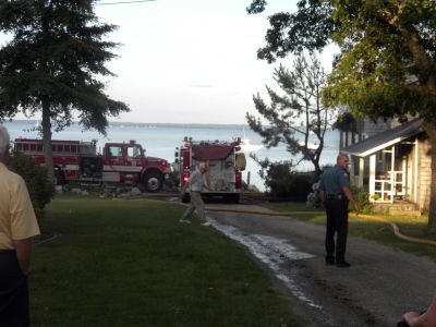 Bay Road Fire
The Mattapoisett Fire Department responded to a house fire on Bay Road at Point Connett around 7pm on Thursday July 22, 2010. The front of the structure was heavily damaged but the Fire Department was able to quickly contain the fire and keep it from spreading to neighboring homes. Photo by Paul Lopes
