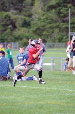 Youth Football 
Old Rochester Regional Bulldog Youth Football player Matthew Lanagan scores a touchdown in the fourth quarter of his game on Sunday, September 9.  Photos by Felix Perez. 
