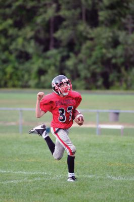 Youth Football 
Old Rochester Regional Bulldog Youth Football player Matthew Lanagan scores a touchdown in the fourth quarter of his game on Sunday, September 9.  Photos by Felix Perez. 
