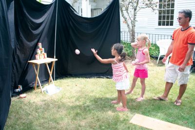 Summer Faire
Happy shoppers united at the Mattapoisett Congregational Churchs annual Summer Faire on July 31, 2010. The upscale yard sale offered great deals on nice furniture items and had a section of toys and games, just for the kids. Photo by Laura Pedulli.
