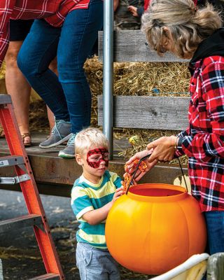 Family Fun Festival 
Attendees to Saturday’s Fall Free Family Fun Festival at Shipyard Park in Mattapoisett saw many smiling children who enjoyed face painting, hayrides, and various pumpkin-related games and goodies. The event was sponsored by the Mattapoisett Lions Club. Photos by Ryan Feeney - October 21, 2021 edition
