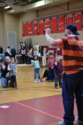 Strengthening Families Fair
There was so much to do and discover on March 1 at the “Strengthening Families Fair”, funded by the Department of Early Education & Care, and coordinated by the Old Rochester Regional School District. The gymnasium at the ORR High School was set up like a kids’ wonderland, with art projects, reading activities, brightly-colored gymnastics equipment, a flowing rainbow parachute, and…everyone’s favorite local children’s music group, “the Toe Jam Puppet Band.” Photo by Jean Perry
