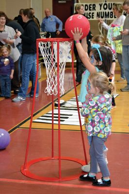 Strengthening Families Fair
There was so much to do and discover on March 1 at the “Strengthening Families Fair”, funded by the Department of Early Education & Care, and coordinated by the Old Rochester Regional School District. The gymnasium at the ORR High School was set up like a kids’ wonderland, with art projects, reading activities, brightly-colored gymnastics equipment, a flowing rainbow parachute, and…everyone’s favorite local children’s music group, “the Toe Jam Puppet Band.” Photo by Jean Perry
