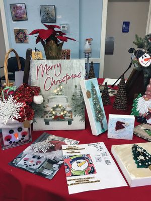 Friends of Marion Council on Aging 
The Friends of Marion Council on Aging extended its outreach by going with tabletop-size trees for its annual Festival of Trees held Saturday at the Cushing Community Center. Raffle tickets are available until December 8. Photos by Marilou Newell
