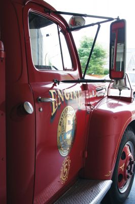 Dunn Deal
The Dunn family of Mattapoisett is donating their iconic Maxim Motors Company 1949 fire engine to the Mattapoisett Rescue Association as of October 2011. From left to right: Mattapoisett Fire Chief Andrew Murray, Gail Dunn and David Dunn. The engine will remain at its current location at 55 County Road, Mattapoisett. Photo by Anne Kakley. September 29, 2011 edition
