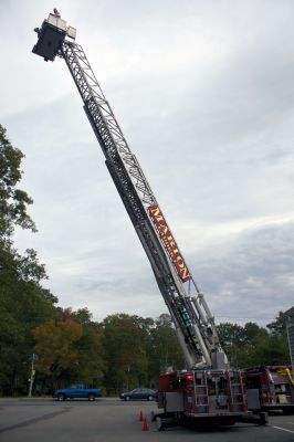 Fire Department Open House
The Marion Fire Department offered kids rides up on the ladder during their annual Fire Prevention Awareness week open house on Sunday, October 7, 2012.  Photo by Eric Tripoli.
