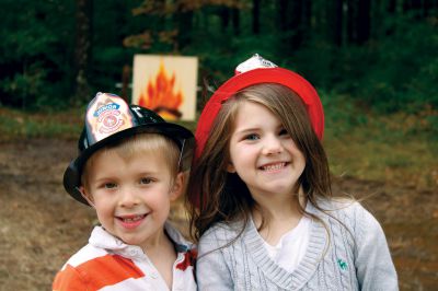 Fire Department Open House
Kent Spooner of Marion (left) and Madelyne Denham of Rochester pose for a photo during the Marion Fire Department's open house on Sunday, October 7, 2012.  The event was held as a kick-off for national Fire Prevention Awareness week.  Photo by Eric Tripoli
