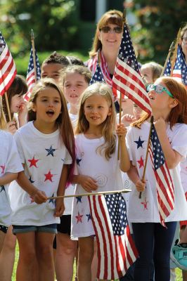 Flag Day
The students of Center School observed Flag Day, Friday, June 14, outside near the flagpole. Also being the last day of school for the year, Principal Rosemary Bowman addressed the children, reminding them how blessed they are to be American and living in Mattapoisett. Photos by Jean Perry
