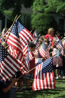 Flag Day
The students of Center School observed Flag Day, Friday, June 14, outside near the flagpole. Also being the last day of school for the year, Principal Rosemary Bowman addressed the children, reminding them how blessed they are to be American and living in Mattapoisett. Photos by Jean Perry
