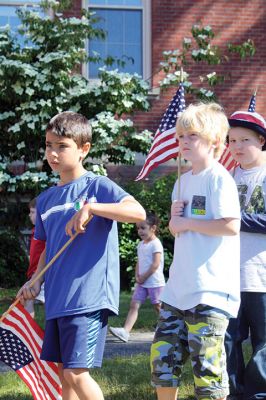 Flag Day
Center School students gathered together with Old Hammondtown students by the Center School flagpole on the morning of Tuesday, June 14, to celebrate Flag Day. The OHS band played a number of tunes, while the Center School students sang patriotic songs and listened to Principal Rose Bowman read a series of poems and writings to remind the children of what the American flag stands for. Afterwards, the third-graders treated the seniors to the school’s annual senior breakfast. Photos by Jean Perry
