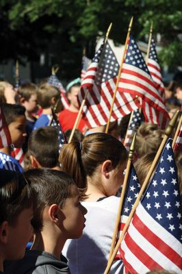 Flag Day
Center School students gathered together with Old Hammondtown students by the Center School flagpole on the morning of Tuesday, June 14, to celebrate Flag Day. The OHS band played a number of tunes, while the Center School students sang patriotic songs and listened to Principal Rose Bowman read a series of poems and writings to remind the children of what the American flag stands for. Afterwards, the third-graders treated the seniors to the school’s annual senior breakfast. Photos by Jean Perry
