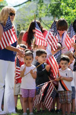 Flag Day
Center School students gathered together with Old Hammondtown students by the Center School flagpole on the morning of Tuesday, June 14, to celebrate Flag Day. The OHS band played a number of tunes, while the Center School students sang patriotic songs and listened to Principal Rose Bowman read a series of poems and writings to remind the children of what the American flag stands for. Afterwards, the third-graders treated the seniors to the school’s annual senior breakfast. Photos by Jean Perry
