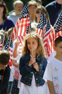 Flag Day
Center School students gathered together with Old Hammondtown students by the Center School flagpole on the morning of Tuesday, June 14, to celebrate Flag Day. The OHS band played a number of tunes, while the Center School students sang patriotic songs and listened to Principal Rose Bowman read a series of poems and writings to remind the children of what the American flag stands for. Afterwards, the third-graders treated the seniors to the school’s annual senior breakfast. Photos by Jean Perry
