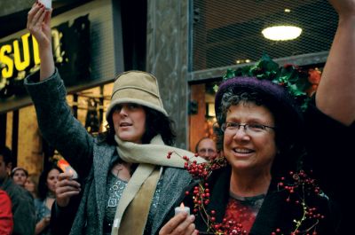 Flash Mob
Mattapoisett native and Old Rochester Regional graduate Chad Michael Peters coordinated a "flash mob" on December 16. The mob of over 200 carolers, including many Tri-Town residents, convened at the Dartmouth Mall to surprise shoppers with a medley of three holiday classics: "Deck the Halls", "Silent Night" and "Jingle Bells". Just as soon as the mob showed up, it dispersed. Photo by Felix Perez.
