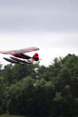 Bristol County Radio Control “RC” Club
Radio control model seaplanes are more than just a hobby for members of the Bristol County Radio Control “RC” Club. As club member Gerry Dupont puts it, “It’s an affliction. A happy affliction.” Dupont’s yellow Piper Cub seaplane features a one-fifth-scale pilot named “Gus” who’s been flying the one-fifth-scale seaplane for seven years. Photos by Jean Perry
