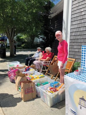 Marion Democratic Town Committee
The Marion Democratic Town Committee held a food drive on June 8 as part of their mission to assist those faced with food insecurity. Donations were distributed to Damien’s Pantry. Photo by Marilou Newell
