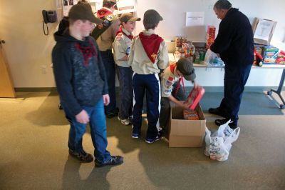 Holiday Food Drive
 Boy Scouts of Troop 32 in Marion celebrate during the last day of their food drive at the Marion Police Department.  The scouts collected over 200 items of non-perishable food for The Family Pantry- Damien’s Place in East Wareham.  Photo by Eric Tripoli.
