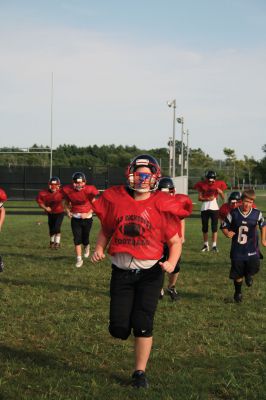 Old Rochester Regional Youth Football
The Old Rochester Regional Youth Football teams are hitting the fields hard in order to prepare for their upcoming 2012 season.  This year marks the seventh year for the program.  With over 150 players in the program, there are six teams and a dedicated staff of coaches and parents for a support system.  The Bulldogs will play their first game on Labor Day Weekend.  Pictures by Katy Fitzpatrick. 
