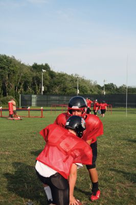 Old Rochester Regional Youth Football
The Old Rochester Regional Youth Football teams are hitting the fields hard in order to prepare for their upcoming 2012 season.  This year marks the seventh year for the program.  With over 150 players in the program, there are six teams and a dedicated staff of coaches and parents for a support system.  The Bulldogs will play their first game on Labor Day Weekend.  Pictures by Katy Fitzpatrick. 
