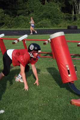 Old Rochester Regional Youth Football
The Old Rochester Regional Youth Football teams are hitting the fields hard in order to prepare for their upcoming 2012 season.  This year marks the seventh year for the program.  With over 150 players in the program, there are six teams and a dedicated staff of coaches and parents for a support system.  The Bulldogs will play their first game on Labor Day Weekend.  Pictures by Katy Fitzpatrick. 
