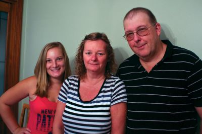 Foster Homes
 For the last decade, the Shaw family of Rochester has opened their home to 20 foster kids. While some children are placed in their home for a few months and others for a few years, they welcome every child who needs a safe, nurturing place to live. (from left) Megan, Amy, Mark Shaw. Photo by Eric Tripoli.  
