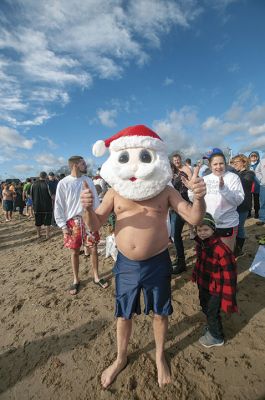 “Freezin’ for a Reason” 
Every year hundreds make waves on New Year’s Day at the Mattapoisett Town Beach for the annual “Freezin’ for a Reason” polar plunge. With the support of local businesses and emergency responders, the event has continued every year, raising thousands of dollars to help local families facing cancer treatment. Photos by Felix Perez
