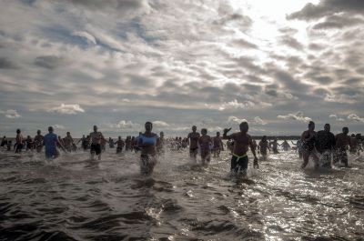 “Freezin’ for a Reason” 
Every year hundreds make waves on New Year’s Day at the Mattapoisett Town Beach for the annual “Freezin’ for a Reason” polar plunge. With the support of local businesses and emergency responders, the event has continued every year, raising thousands of dollars to help local families facing cancer treatment. Photos by Felix Perez
