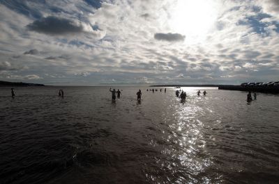 “Freezin’ for a Reason” 
Every year hundreds make waves on New Year’s Day at the Mattapoisett Town Beach for the annual “Freezin’ for a Reason” polar plunge. With the support of local businesses and emergency responders, the event has continued every year, raising thousands of dollars to help local families facing cancer treatment. Photos by Felix Perez
