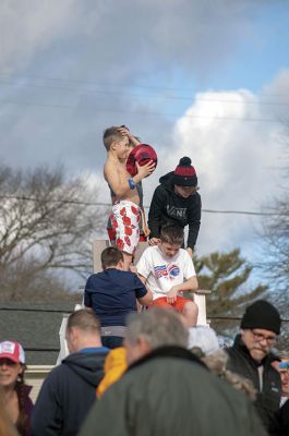 “Freezin’ for a Reason” 
Every year hundreds make waves on New Year’s Day at the Mattapoisett Town Beach for the annual “Freezin’ for a Reason” polar plunge. With the support of local businesses and emergency responders, the event has continued every year, raising thousands of dollars to help local families facing cancer treatment. Photos by Felix Perez
