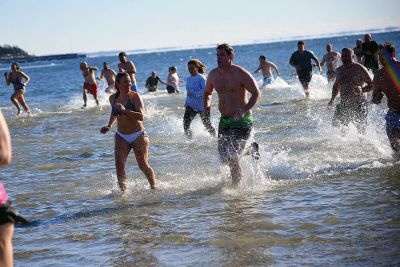 Freezin’ for a Reason
January 1 found locals Freezin’ for a Reason again at the annual polar plunge fundraiser to benefit those who are fighting cancer in our own community. At Mattapoisett Town Beach that morning, the air temperature was in the single digits and the water was a frigid 40 degrees. Photos by Glenn C. Silva
