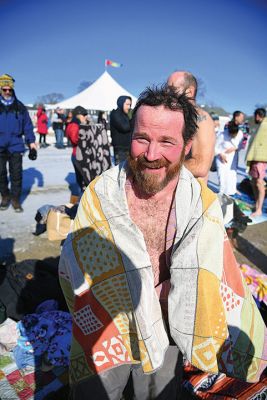 Freezin’ for a Reason
January 1 found locals Freezin’ for a Reason again at the annual polar plunge fundraiser to benefit those who are fighting cancer in our own community. At Mattapoisett Town Beach that morning, the air temperature was in the single digits and the water was a frigid 40 degrees. Photos by Glenn C. Silva
