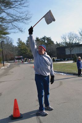 Frosty Runner Road Race
Runners who participated in the third annual Frosty Runner Road Race enjoyed spring-like weather, perfect for a 10 mile or 3 mile run through the neighborhoods of Rochester. The two separate races were run simultaneously, beginning and ending at Old Colony Regional Vocational Technical High School on Saturday February 1. The race was rescheduled from January 25, when the weather was a little too frosty for the event. Photo by Jean Perry
